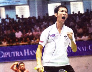 Born to be wild: Nguyen Tien Minh reacts after defeating Rumbaka Dyonisius Hayom, of Indonesia, 21-13, 21-15 in the men's singles final of the Ciputra Hanoi-Vietnam Challenge yesterday. Minh defends his title and goes home with $1,125 and 4,000 points bonuses.