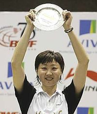Worthy winner: Hong Kong&rsquo;s Zhou Mi holding the trophy after winning the women&rsquo;s singles final Sunday.