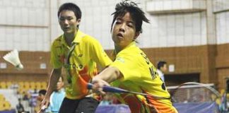 Beaten pair: Malaysia&rsquo;s Shevon Lai Jemie returning a shot while Goh Jian Hao looks on during their match against Vietnam&rsquo;s Bui Quang Tuan-Vu Thi Trang at the Asian Junior Championships Sunday.