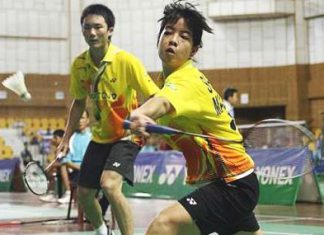 Beaten pair: Malaysia&rsquo;s Shevon Lai Jemie returning a shot while Goh Jian Hao looks on during their match against Vietnam&rsquo;s Bui Quang Tuan-Vu Thi Trang at the Asian Junior Championships Sunday.