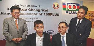 Signed, sealed, delivered: Lee Chong Wei signing the sponsorship deal with 100Plus yesterday in the presence of (from left) BAM president Datuk Mohd Nadzmi Mohd Salleh, Fraser and Neave Pte. Ltd regional office General Manager of marketing Chris Ng and F&N Coca Cola (M) Sdn. Bhd. National Corporate Affairs manager Datuk Kamal Harun.