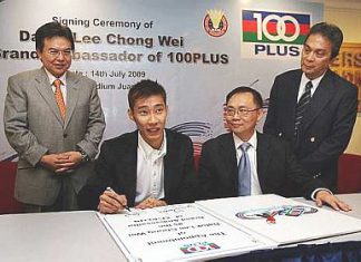 Signed, sealed, delivered: Lee Chong Wei signing the sponsorship deal with 100Plus yesterday in the presence of (from left) BAM president Datuk Mohd Nadzmi Mohd Salleh, Fraser and Neave Pte. Ltd regional office General Manager of marketing Chris Ng and F&N Coca Cola (M) Sdn. Bhd. National Corporate Affairs manager Datuk Kamal Harun.