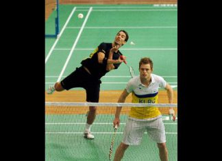 England badminton players Nathan Robertson, left, and Andrew Smith practice with teammates at the venue of the World Badminton Championships in Hyderabad, India on Aug. 8, 2009.