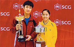 PODIUM: Boonsak Ponsana and 14-year-old Rachanok Intanon hold their silverware at the All-Thailand Championships.