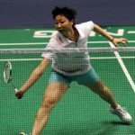 Zhou Mi of Hong Kong, China returns the shuttle during women’s singles second round match agasint Shizuka Uchida of Japan at 2009 China Badminton Masters Super Series in Changzhou, east China’s Jiangsu Province, Sept. 17, 2009. Zhou Mi won 2-0(21-7, 21-17).