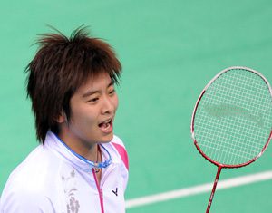 Wang Lin of Zhejiang province jubilates after the women's singles final of badminton against Wang Shixian of Jiangsu province at the 11th Chinese National Games in Jinan, east China's Shandong Province, Oct. 17, 2009. Wang won the match 2-1 and claimed the title of the event.