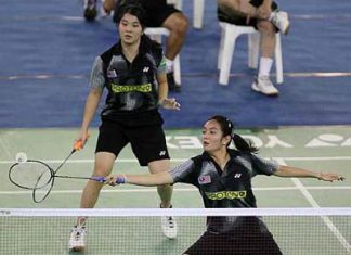 Immaterial defeat: Malaysia&rsquo;s Lai Pei Jing (front) and Ng Hui Ern in action against Singapore&rsquo;s Thng Ting Ting-Chen Jiayuan during their World Junior Championships Group Z match on Friday. Pei Jing-Hui Ern lost 19-21, 21-16, 24-26.
