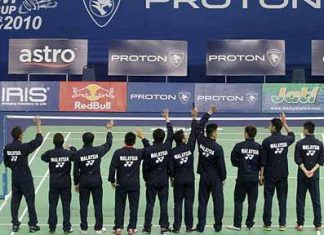 Peace wave? Malaysia's badminton squad wave to fans before the tournament proper gets under way