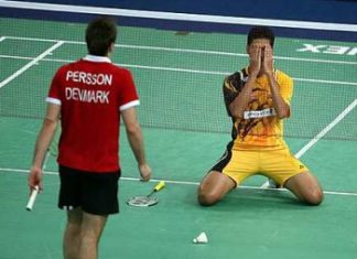 Hafiz the hero: Malaysia's third singles player Mohd Hafiz Hashim celebrates after defeating Denmark's Joachim Persson 21-12, 21-10 for the winning point in their Thomas Cup quarter-final tie at the Putra Stadium in Bukit Jalil last night.
