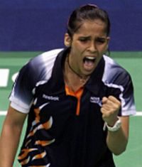 Home favourite: Saina Nehwal celebrates after defeating Wong Mew Choo in the women&rsquo;s singles final Thursday.