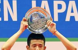 Earning respect: China&rsquo;s Chen Long raising his winning plate on the podium after he won the Japan Open men&rsquo;s singles title by beating Malaysia&rsquo;s Lee Chong Wei 21-8, 10-21, 21-19 in the final on Sunday.
