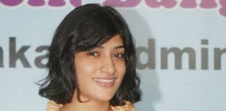 The new poster girl of badminton, Ashwini Ponnappa, says there is not much hoi halla 'cos she is a doubles player.