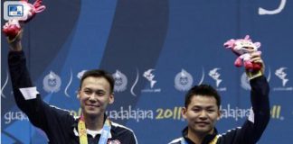 Tony Gunawan (left) and Howard Bach of the United States celebrate winning the gold in the men's doubles badminton event at the Pan American Games in Guadalajara, Mexico.