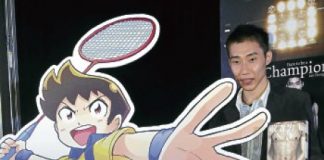 Lee Chong Wei holding a copy of his autobiography &lsquo;Dare to be a Champion&rsquo; beside a cutout of the comic &lsquo;Jejak Libasan Jaguh&rsquo; yesterday. Read more: Chong Wei ready for China backlash - Badminton - New Straits Times http://www.nst.com.my/sports/badminton/chong-wei-ready-for-china-backlash-1.34370#ixzz1jsTeaZ7V