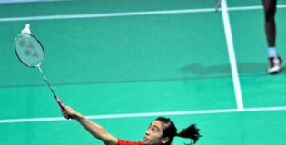 Belaetrix Manuputi hits a backhand against Lekha Shehani of Sri Lanka in their Uber Cup qualifying match in Macau on Monday. Belaetrix won 21-17, 21-11 in her debut with the national team