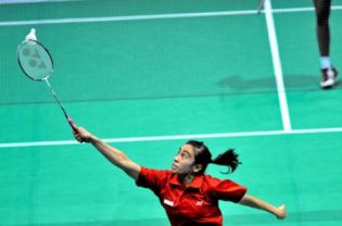 Belaetrix Manuputi hits a backhand against Lekha Shehani of Sri Lanka in their Uber Cup qualifying match in Macau on Monday. Belaetrix won 21-17, 21-11 in her debut with the national team