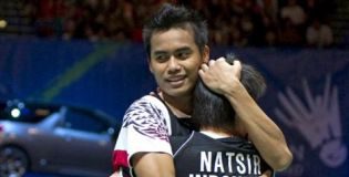 Tontowi Ahmad and Liliyana Natsir celebrate following their victory over Thomas Laybourn and Kamilla Rytter Juhl during the mixed doubles final of the All England Open Championships at the National Indoor Arena in Birmingham on Sunday.