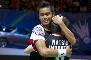 Tontowi Ahmad and Liliyana Natsir celebrate following their victory over Thomas Laybourn and Kamilla Rytter Juhl during the mixed doubles final of the All England Open Championships at the National Indoor Arena in Birmingham on Sunday.