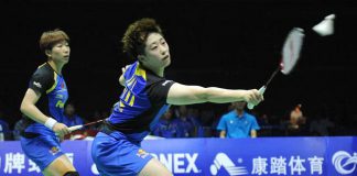 Wang Xiaoli (L) and Yu Yang (R) of China compete against Duanganong Aroonkesorn and Kunchala Voravichitchaikul of Thailand during the semi-final match at the Uber Cup.