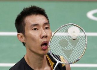 Malaysia's Lee Chong Wei plays against China's Chen Long during their men's singles badminton semifinals match during the London 2012 Olympic Games at the Wembley Arena August 3, 2012