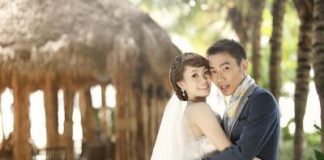 Love birds: Lee Chong Wei and Wong Mew Choo posing during one of their photoshoots at the Sepang Gold Coast Palm Tree Resort Thursday