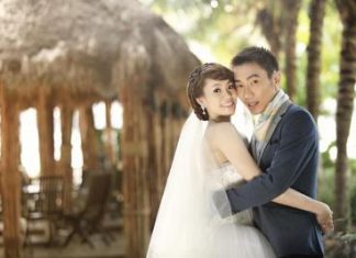 Love birds: Lee Chong Wei and Wong Mew Choo posing during one of their photoshoots at the Sepang Gold Coast Palm Tree Resort Thursday