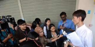 Facing the press: Lee Chong Hoon, brother of Chong Wei, speaking to reporters yesterday.