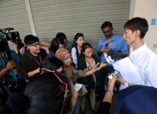 Facing the press: Lee Chong Hoon, brother of Chong Wei, speaking to reporters yesterday.