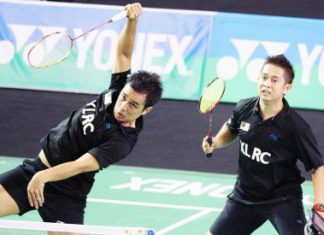 Rising to the occasion: Mohd Fairuzizuan Mohd Tazari (left) and Mohd Zakry Abdul Latif beat Indonesians Angga Pratama-Ryan Agung Saputra 21-12, 21-14 in the final.
