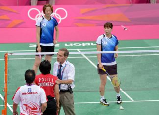 Referee Torsten Berg tried to get players from Indonesia (near court) and South Korea to try their hardest during this match at the London Olympics. The format gave some teams an incentive to lose &mdash; in order to get easier opponents in upcoming matches. That format's being changed