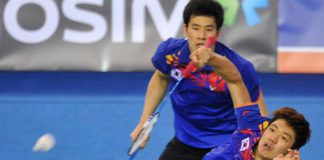 South Korea's Lee Yong-Dae (front) and Ko Sung-Hyun(B) play a shot during their men's doubles badminton match against Mathias Boe and Carsten Mogensen of Denmark during the finals of the Korea Open at Seoul on January 13, 2013.