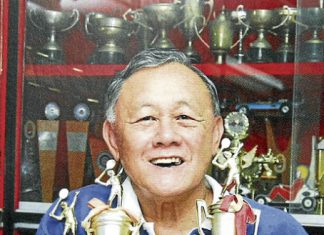 The late Datuk Eddy Choong with some of the many trophies he had won in a stellar career.
