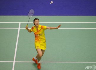 Li XueRui of China crashes out of All England