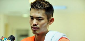 Olympic gold-medallist Lin Dan of China speaks to the Chinese media