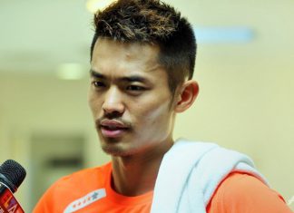 Olympic gold-medallist Lin Dan of China speaks to the Chinese media