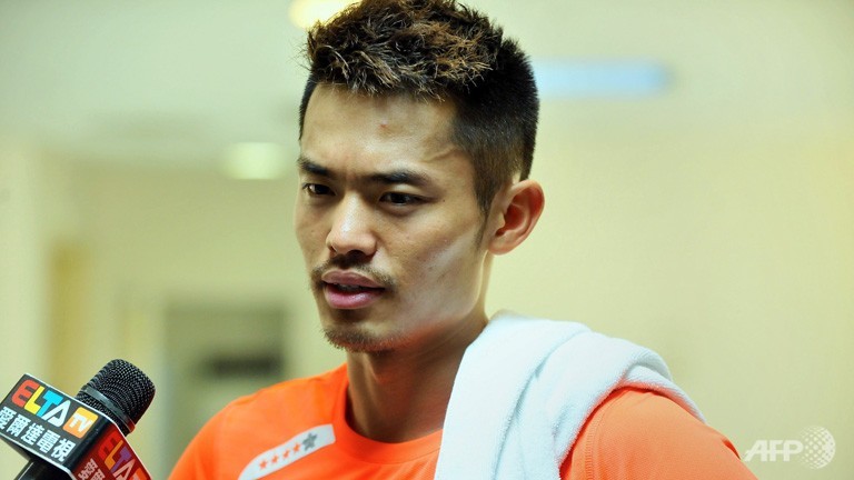 Olympic gold-medallist Lin Dan of China speaks to the Chinese media