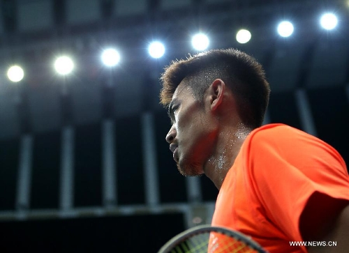 China's Lin Dan reacts during the men's singles third round match against Kazumasa Sakai of Japan at the Badminton Asia Championships in Taipei, southeast China's Taiwan, on April 18, 2013. Lin won 2-1.