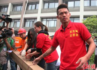 China's most famous badminton couple, world champions Lin Dan and Xie Xingfang, donate 2.2 million yuan to the quake-hit zone in Sichuan province. The couple arrive in Ya'an city on Monday, April 22, 2013 to visit and console the survivors. Their donation is the largest from China's sports circle. A 7.0-magnitude earthquake jolted Lushan County of Ya'an City in the morning on April 20.