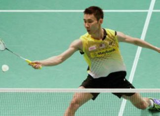 Back to you: Lee Chong Wei returns a shot to Taiwan&rsquo;s Yang Chih-hsun during their Group C opening match at the Putra Stadium yesterday.