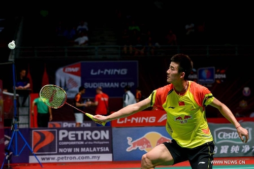 China's Chen Long competes during the men's singles badminton match against Indonesia's Tommy Sugiarto at the quarterfinals of the Sudirman Cup World Team Badminton Championships in Kuala Lumpur, Malaysia, on May 23, 2013. Chen won 2-0.