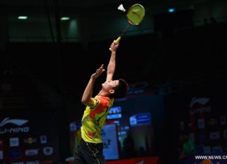 China's Chen Long competes during the men's singles badminton match against Indonesia's Tommy Sugiarto at the quarterfinals of the Sudirman Cup World Team Badminton Championships in Kuala Lumpur, Malaysia, on May 23, 2013. Chen won 2-0.