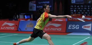 China's Li Xuerui hits a return against Indonesia's Lindaweni Fanetri