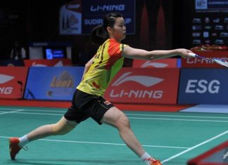 China's Li Xuerui hits a return against Indonesia's Lindaweni Fanetri