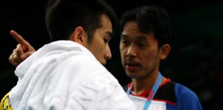 Malaysia's Chong Wei Feng receiving some words of advice from national singles chief coach Rashid Sidek (right) during his first round match against England's Rajiv Ouseph.