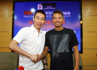 Face-off: World No.1 Lee Chong Wei (left) and China's four-time world champion Lin Dan during a press conference at the Tianhe Gymnasium.