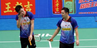 Koo Kien Keat (right) and Tan Boon Heong react after losing to South Korea's Kim Ki-jung-Kim Sa-rang in the quarter-finals of the World Championships.