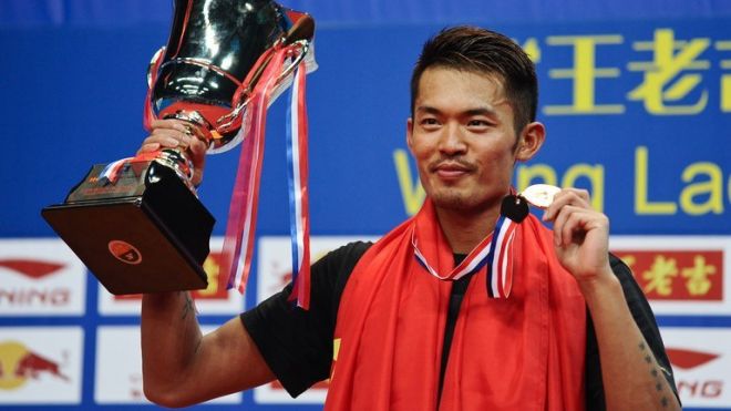 Lin Dan holds the winner's trophy after defeating Lee Chong Wei at the World Badminton Championships in China on August 11, 2013. He breezed into the final without dropping a game, even against China's world number two Chen Long in the quarter-finals.