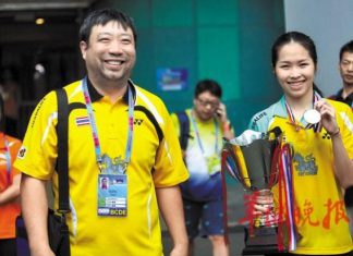 That man beaming in many pictures behind Thai badminton world champion Ratchanok "May" Intanon is Xie Zhihua, her Chinese coach and, for her, a second father.