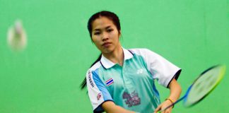 In this Friday, Aug. 16,2013 photo, Thailand's Ratchanok Inthanon serves during a training session in Bangkok, Thailand. The Thai teenager last week became the youngest-ever world badminton champion, and the first Thai player to win a world title.