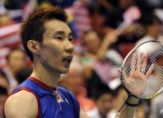 Top-seeded Lee Chong Wei acknowledges the cheers after his victory over Kenichi Tago in the men's singles final match at the Japan Open. Lee won 23-21, 21-17.